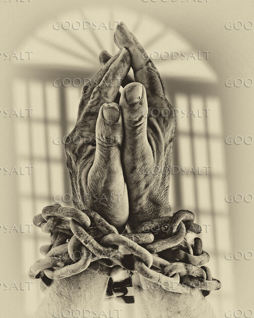 Hands Raised in Light and Chain